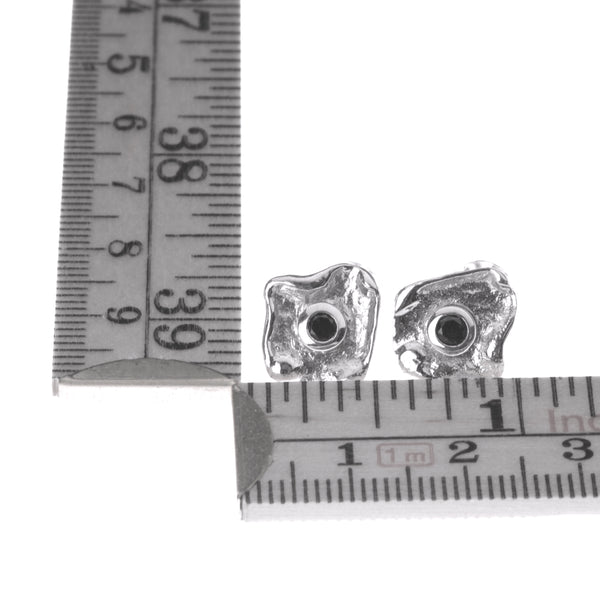 Metal sterling silver earrings with black zirconia stone