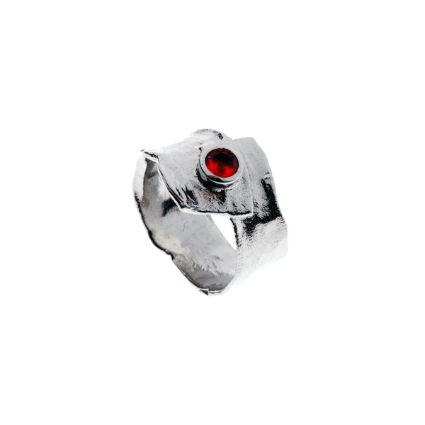 Metal silver ring with red cubic zirconia stone