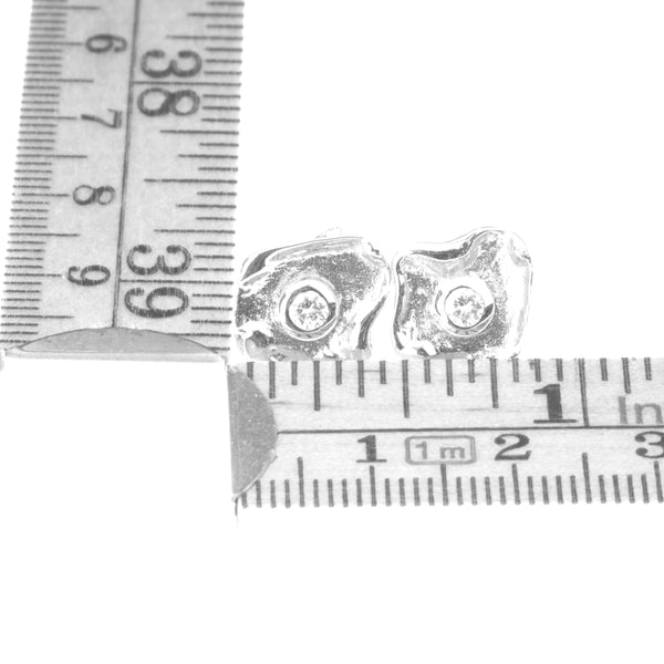 Metal sterling silver earrings with white zirconia stone